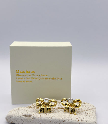 Gold Ribbon Stud Earrings – Playful Sparkle 🎀✨